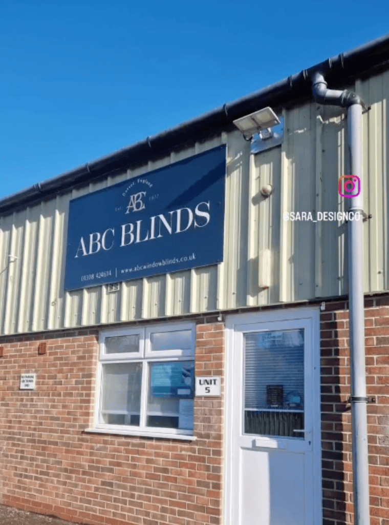 A photo showing the outside of ABC Blinds showroom and the signage using their brand design